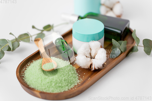 Image of bath salt, serum, moisturizer and oil on tray