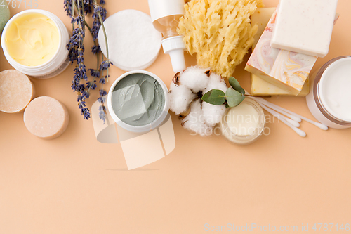 Image of soap, brush, sponge, clay mask and body butter