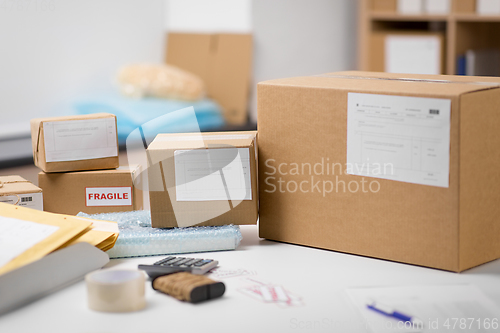 Image of parcel boxes and packing stuff at post office