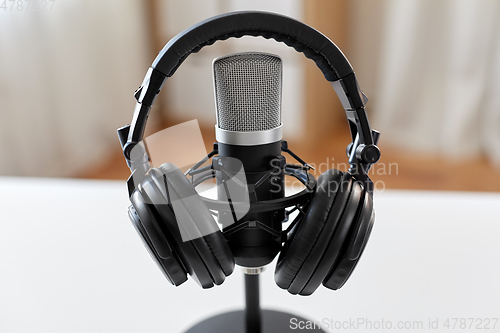 Image of headphones and microphone at home office