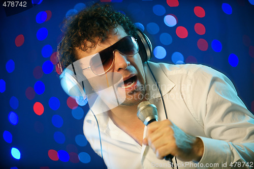 Image of Male DJ with microphone