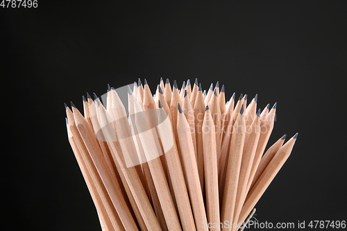 Image of Bunch of pencils isolated on black