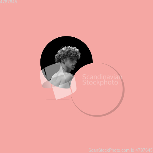 Image of Modern design, contemporary art collage. Inspiration, idea, trendy urban magazine style. Beautiful male portrait rounded on coral pink background