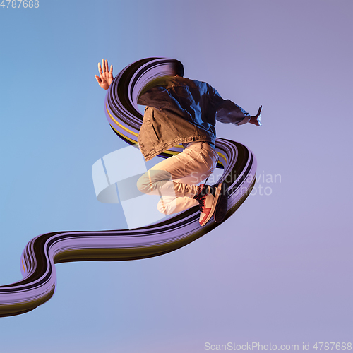 Image of Stylish man with long fluid flood on gradient background. Negative space to insert your text. Modern design. Contemporary colorful and conceptual bright art collage.