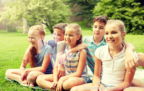 Image of group of happy kids or friends outdoors