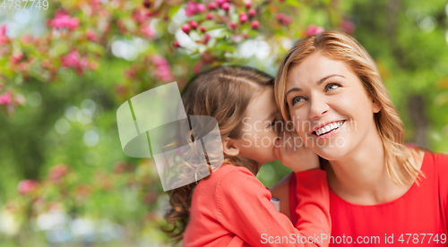 Image of happy mother and daughter whispering her secret