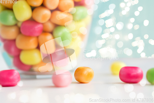 Image of close up of colorful candy drops on table