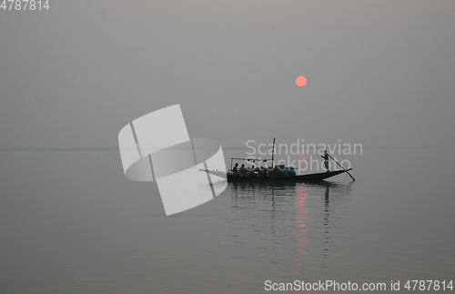 Image of A stunning sunrise looking over the holiest of rivers in India. Ganges delta in Sundarbans, West Bengal, India.