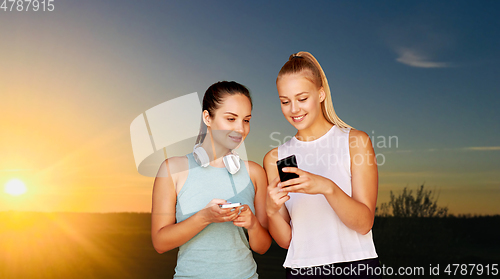 Image of women or female friends with smartphones