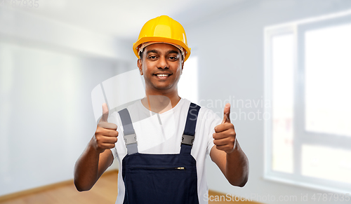 Image of happy indian worker or builder showing thumbs up