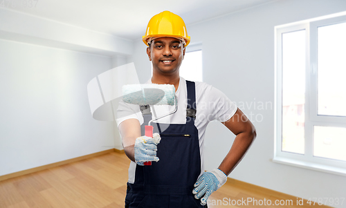 Image of happy indian painter or builder with paint roller