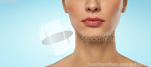 Image of close up of beautiful young woman face and neck