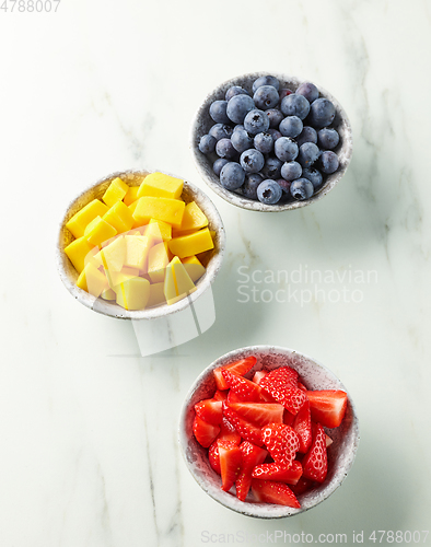 Image of bowls of fresh fruit and berries
