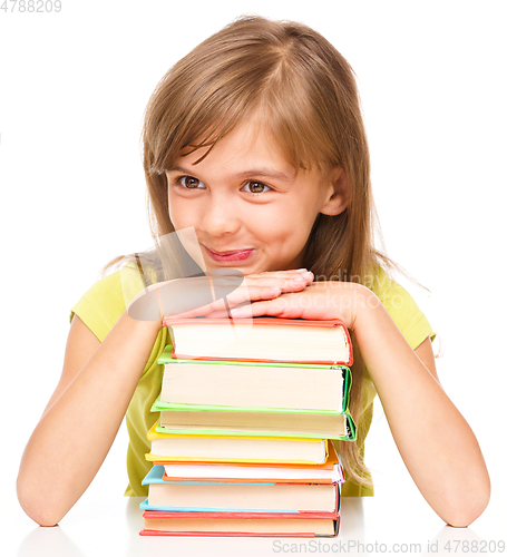 Image of Little girl with her books