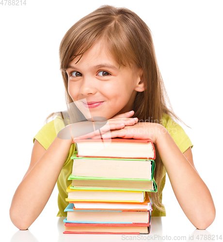 Image of Little girl with her books