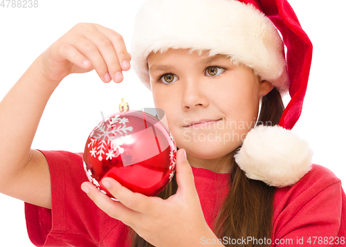 Image of Young happy woman in christmas cloth