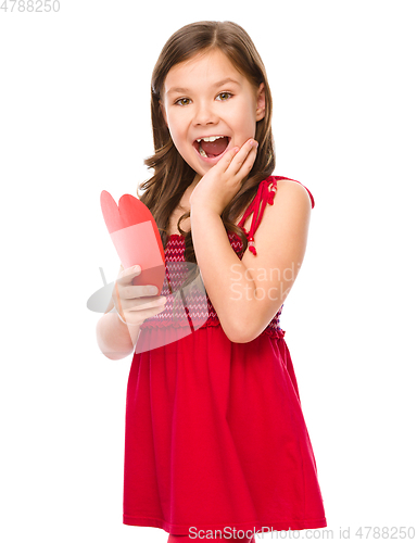 Image of Portrait of a little girl in red