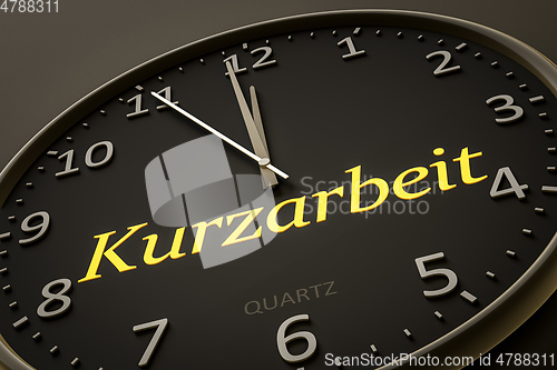 Image of clock with text short-time work in german language