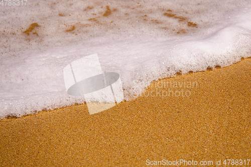 Image of sandy beach shore line texture background