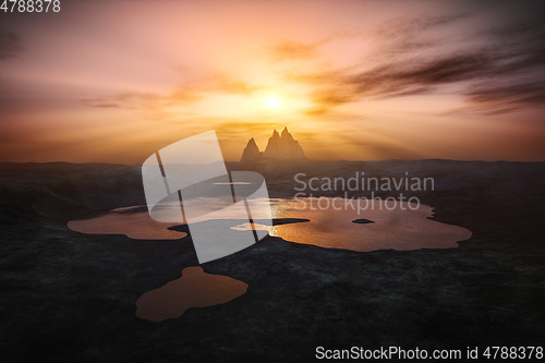 Image of sunset over spiky mountains