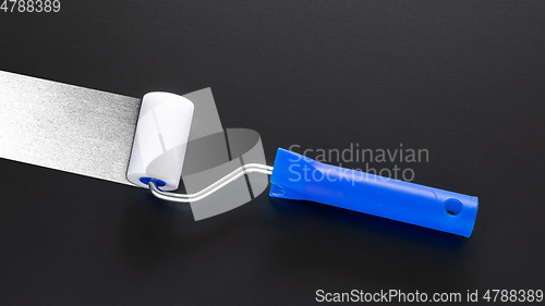 Image of painting roller isolated on black background