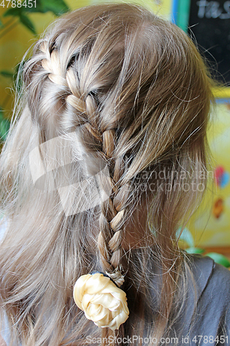 Image of little girl with a modern hairdo