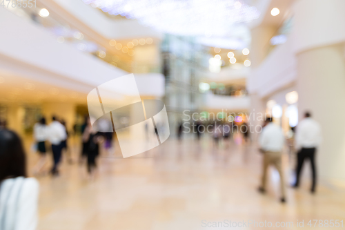 Image of Blurred image of shopping mall and people