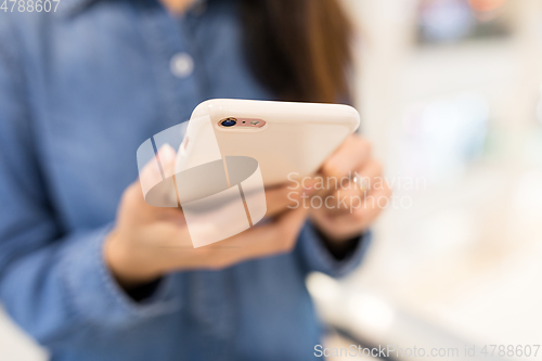 Image of Woman use of mobile phone