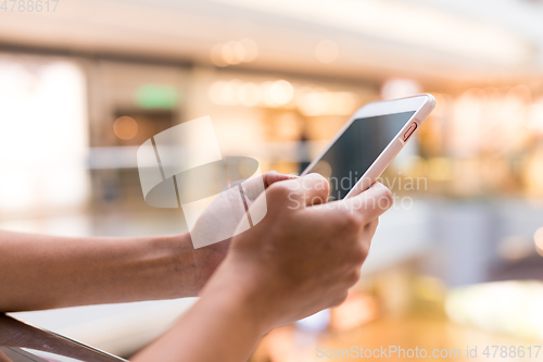 Image of Woman using smart phone