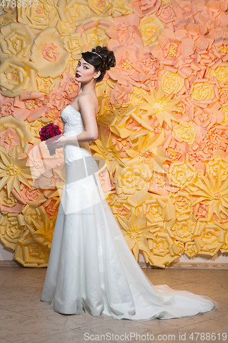 Image of beautiful girl in wedding gown