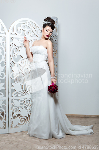 Image of beautiful girl in wedding gown