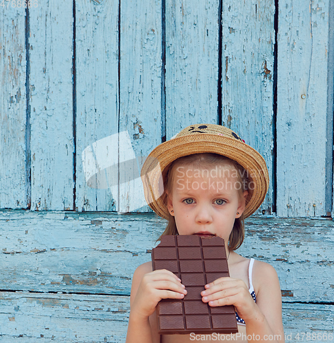 Image of Girls eat chocolate