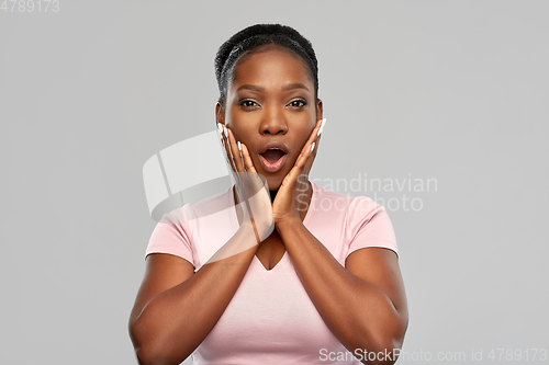 Image of shocked african american woman with open mouth