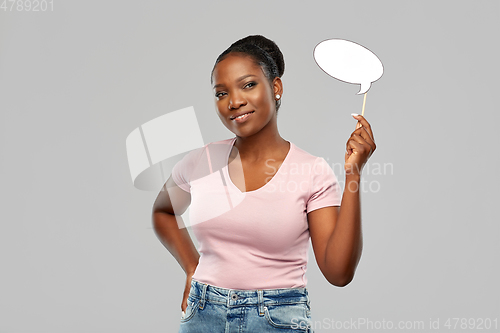 Image of happy african american woman holding speech bubble