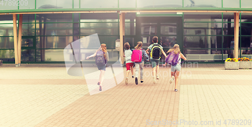 Image of group of happy elementary school students running