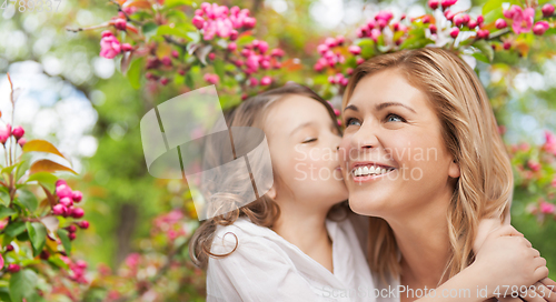 Image of daughter kissing and hugging happy mother