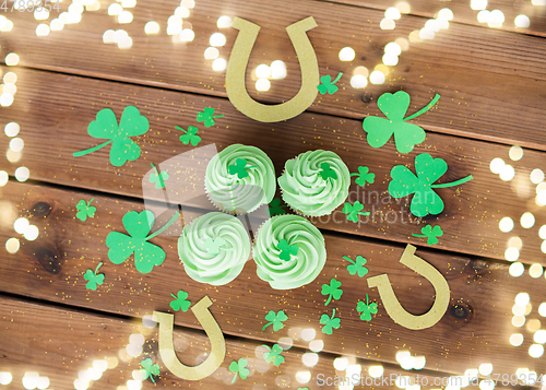 Image of green cupcakes, horseshoes and shamrock