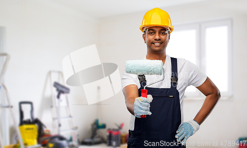 Image of happy indian painter or builder with paint roller