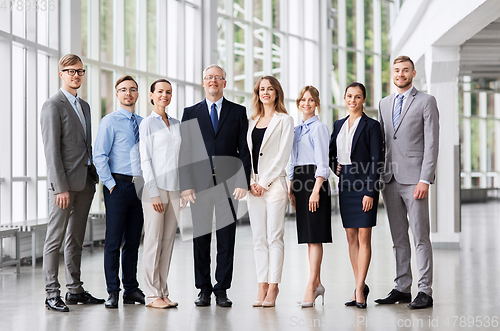 Image of business people at office building