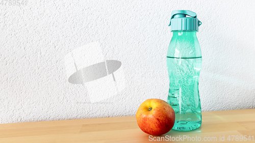 Image of apple and a water bottle on a wooden table