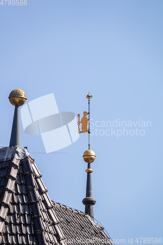 Image of golden figure on a roof top of Calw Germany