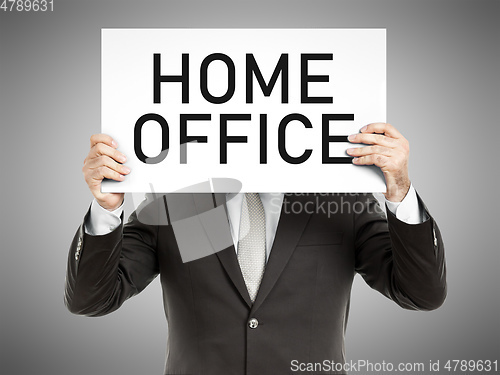 Image of business man message home office