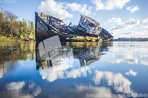 Image of Wreck boat sinking in the clouds