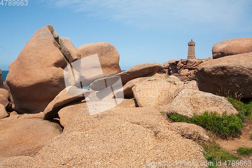 Image of Pink granite boulders and lighthouse in ploumanach