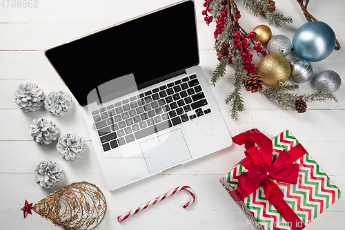 Image of Mock up blank empty screen of laptop on white background