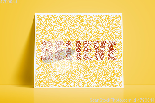 Image of textured card with the word believe