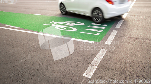 Image of car on a bicycle lane