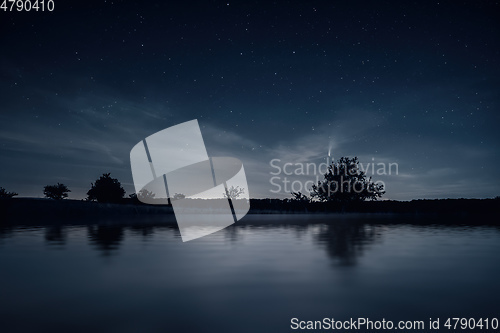 Image of night scenery with comet Neowise