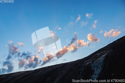 Image of evening sky background with rock foreground