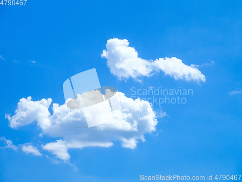 Image of blue sky with cloud forms